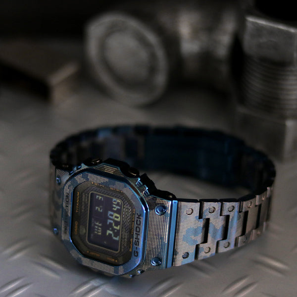 初代G-SHOCK、DW-5000Cの遺伝子を受け継ぐフルメタルスクエアモデルのGMW-B5000から、カモフラージュ柄のカラーモデルが登場‼