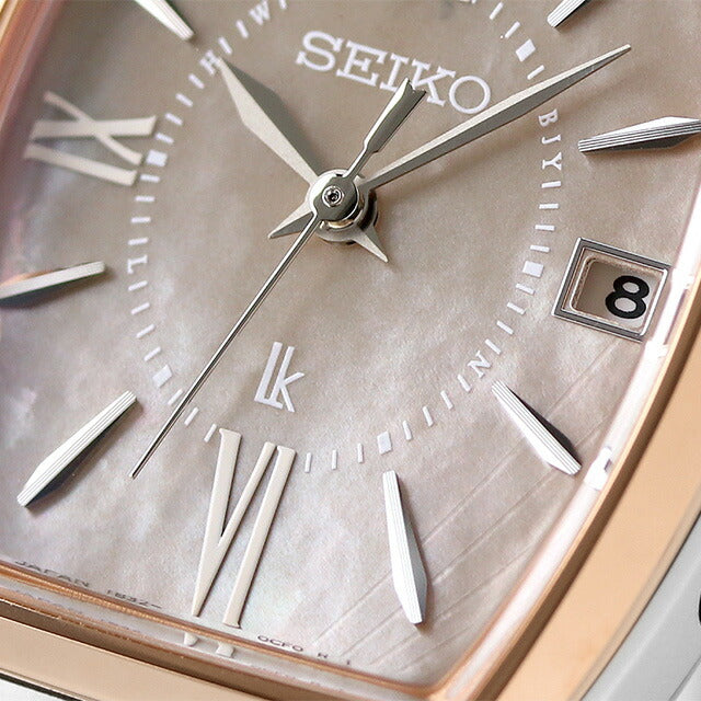 Seiko Rukia太阳能电台观看品牌女子钛Seiko SSQW072模拟粉红色贝壳在日本制造SSQW072