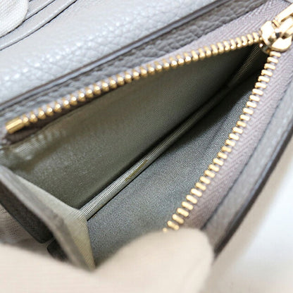 中古 フェラガモ 二つ折り財布 二折財布 コンパクト レディース ブランド FERRAGAMO ガンチーニ 22 D514 グレー USDFR116047011