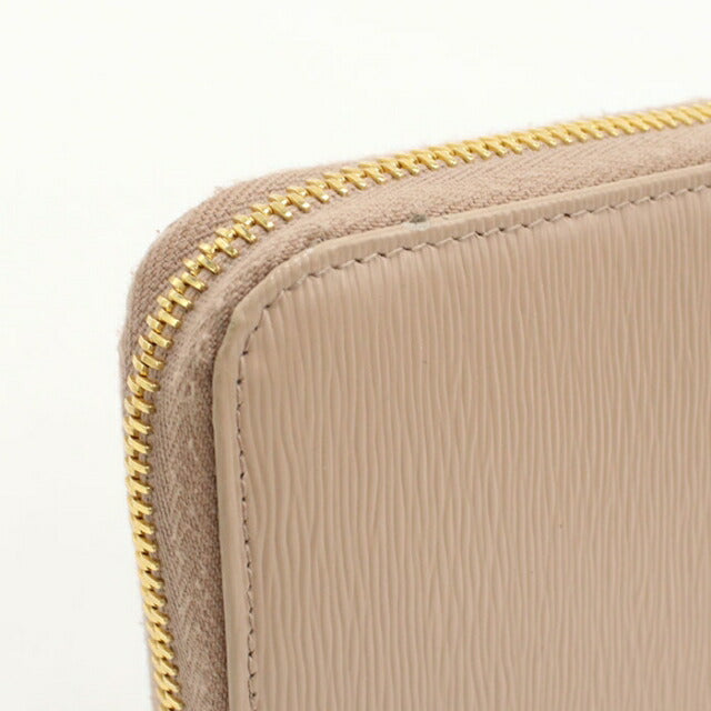 Used Prada long wallet round zipper ladies brand PRADA zip around long wallet leather 1ML506 beige USDPR111083011
