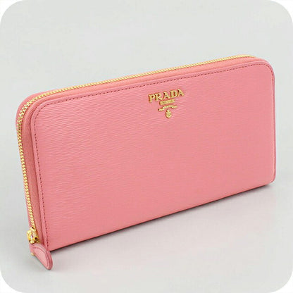 Used Prada long wallet round zipper ladies brand PRADA Vitellomove leather 1ML506 pink USDPR120581011