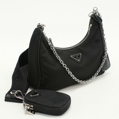 使用的Prada Crossbody肩带为女性品牌Prada Prada Re Edition 2005 1BH204黑色包USDPR95735011